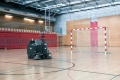 ROS1300-ride-on-sweeper_28-School-cort-ps-WebsiteLarge-JNJNJNJ.png